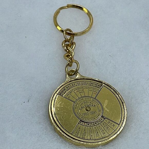 Vintage brass 50 year perpetual calendar nautical keychain. - Picture 1 of 7